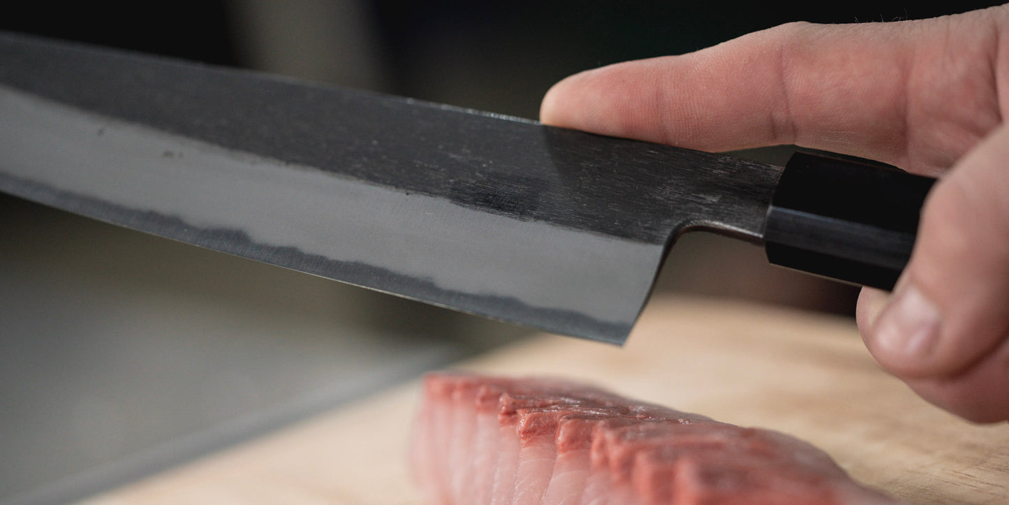 KURO Kurouchi Carbon Steel Clad Gyuto